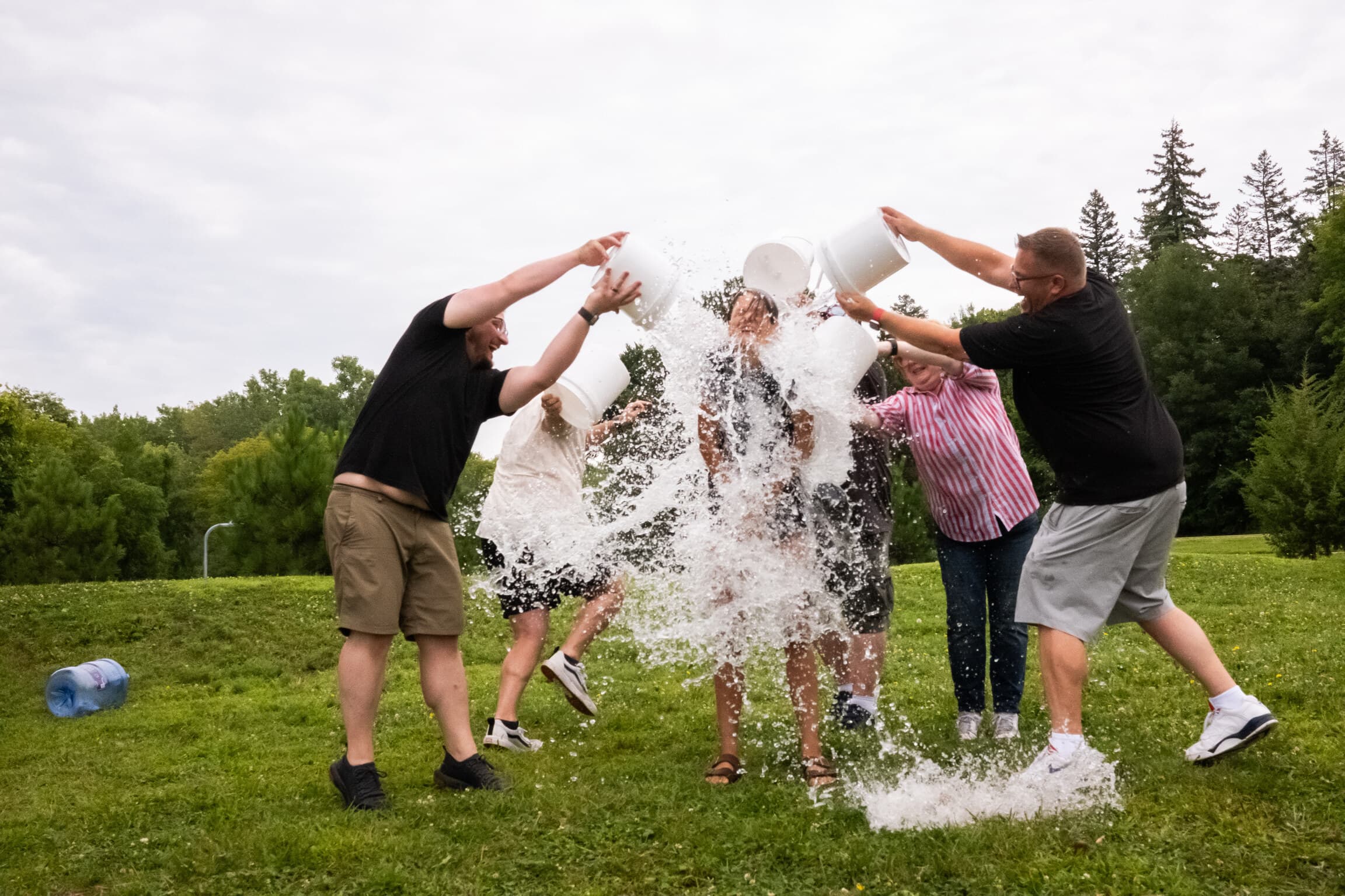 A joyful outdoor baptism at a Corner Church United Service